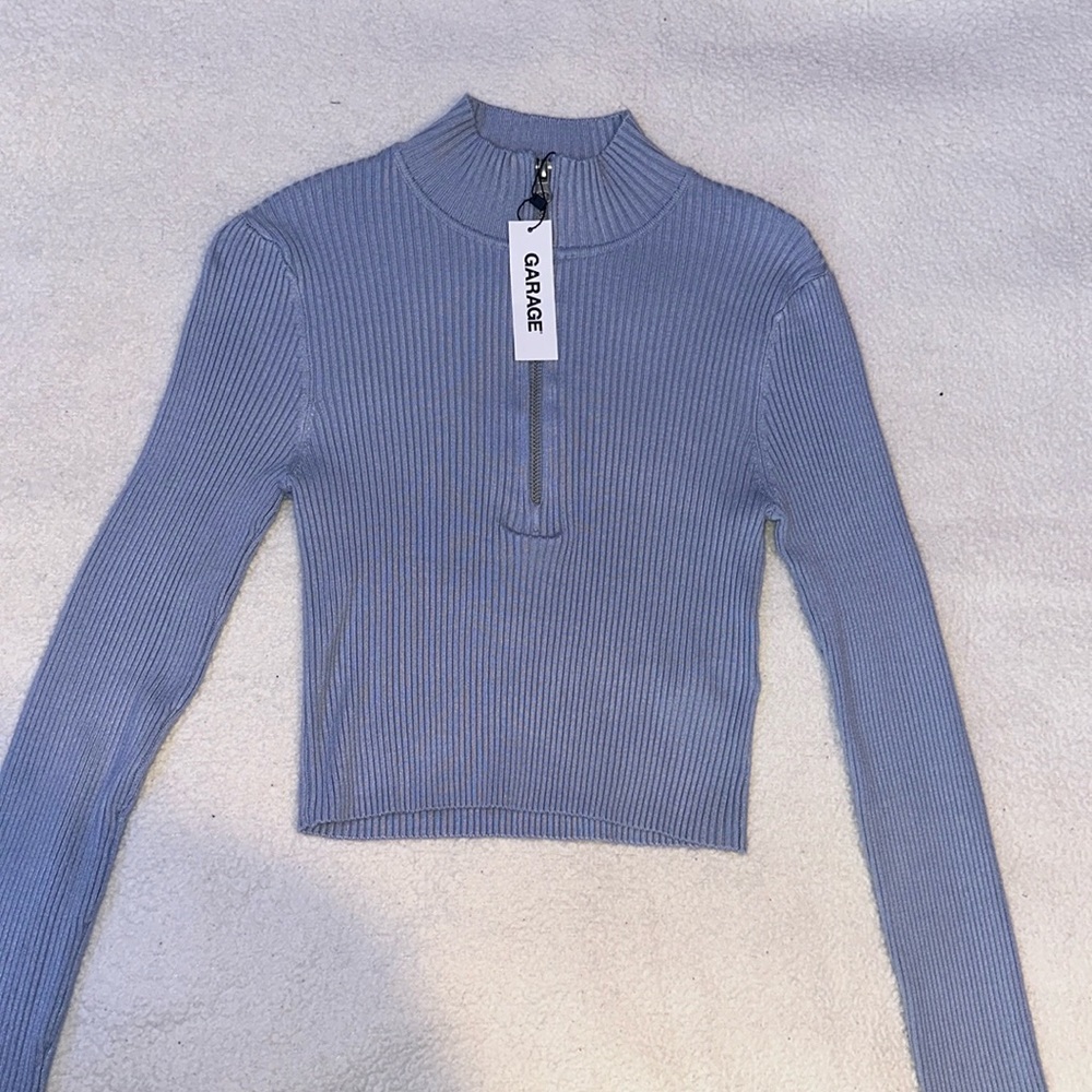 Light blue half zip sweater from garage. Size small.